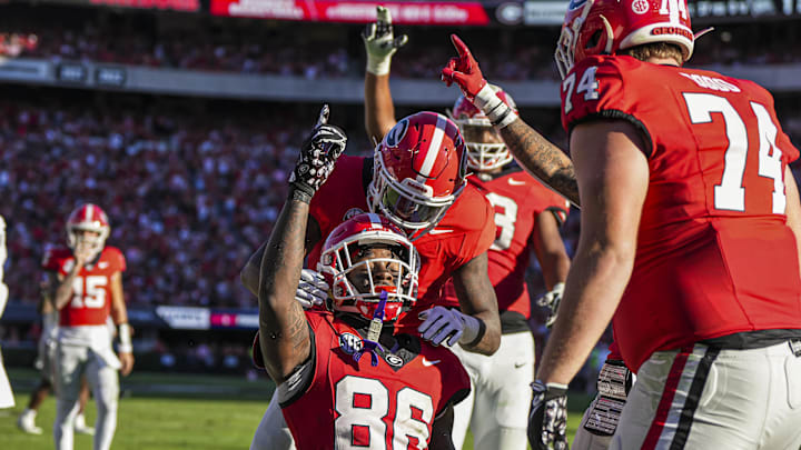 Oct 12, 2024; Athens, Georgia, USA; Georgia Bulldogs wide receiver Dillon Bell (86) reacts with teammates after catching a touchdown pass against the Mississippi State Bulldogs during the first half at Sanford Stadium. Mandatory Credit: Dale Zanine-Imagn Images Oct 12, 2024; Athens, Georgia, USA; Georgia Bulldogs wide receiver Dillon Bell (86) reacts with teammates after catching a touchdown pass against the Mississippi State Bulldogs during the first half at Sanford Stadium. Mandatory Credit: Dale Zanine-Imagn Images