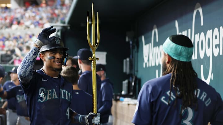 Seattle Mariners center fielder Julio Rodriguez (44) is congratulated by shortstop J.P. Crawford (3) after his three-run home run against the Texas Rangers in the fifth inning at Globe Life Field on Sept 20. Seattle Mariners center fielder Julio Rodriguez (44) is congratulated by shortstop J.P. Crawford (3) after his three-run home run against the Texas Rangers in the fifth inning at Globe Life Field on Sept 20.