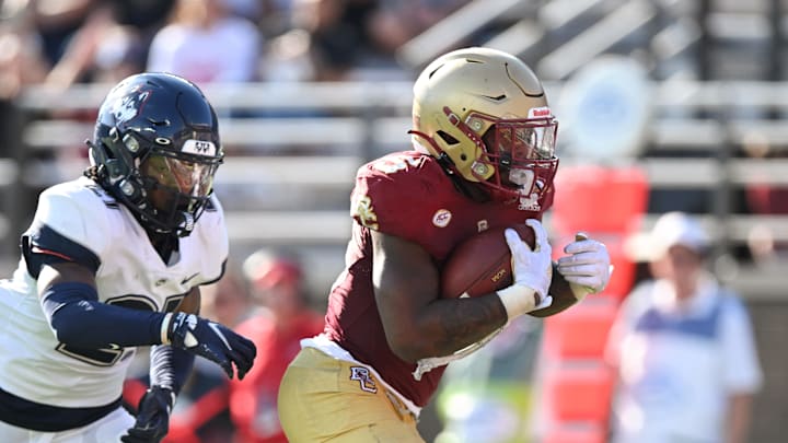 Oct 28, 2023; Chestnut Hill, Massachusetts, USA; Boston College Eagles running back Kye Robichaux (5) runs for a touchdown against the Connecticut Huskies during the second half at Alumni Stadium. Mandatory Credit: Brian Fluharty-Imagn Images