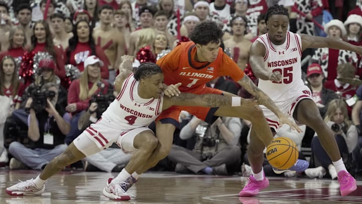 Wisconsin guard Kamari McGee (4) and guard Jphn Blackwell (25) guard Illinois forward Will Riley (7) during the second half of their game Tuesday, February 18, 2025 at the Kohl Center in Madison, Wisconsin. Wisconsin beat Illinois 95-74.

Mark Hoffman/Milwaukee Journal Sentinel Mandatory Credit:  Mark Hoffman/USA TODAY NETWORK via Imagn Images