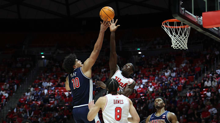 Jan 3, 2026; Salt Lake City, Utah, USA; Arizona Wildcats forward Koa Peat (10) takes a shot against the Utah Utes during the first half at Jon M. Huntsman Center. Mandatory Credit: Rob Gray-Imagn Images