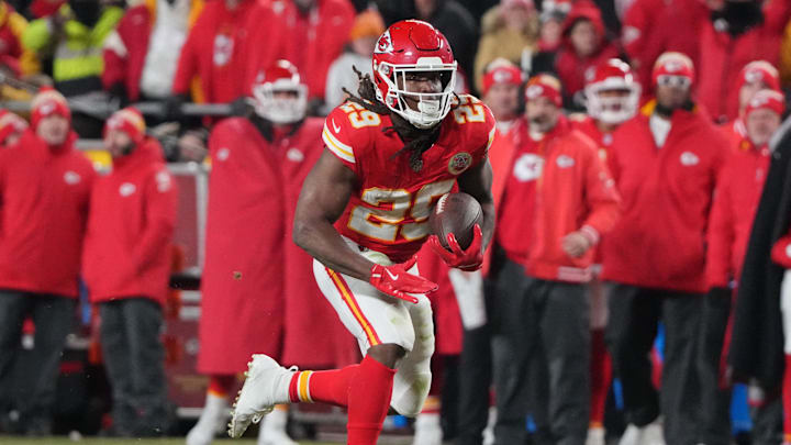 Jan 18, 2025; Kansas City, Missouri, USA; Kansas City Chiefs running back Kareem Hunt (29) runs the ball against the Houston Texans during the fourth quarter of a 2025 AFC divisional round game at GEHA Field at Arrowhead Stadium. Mandatory Credit: Denny Medley-Imagn Images