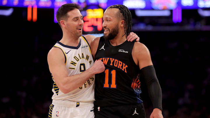 Feb 10, 2026; New York, New York, USA; Indiana Pacers guard T.J. McConnell (9) puts his arm around New York Knicks guard Jalen Brunson (11) during the third quarter at Madison Square Garden. Mandatory Credit: Brad Penner-Imagn Images