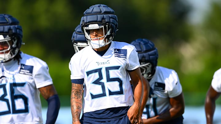Jul 24, 2025; Nashville, TN, USA;  Tennessee Titans cornerback Jalen Kimber (35) stretches during training camp at Ascension Saint Thomas Sports Park. Mandatory Credit: Steve Roberts-Imagn Images