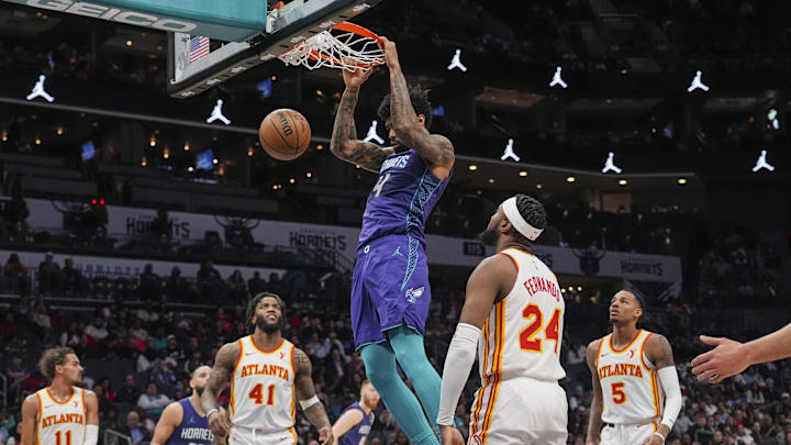 Feb 14, 2024; Charlotte, North Carolina, USA; Charlotte Hornets center Nick Richards (4) with a dunk