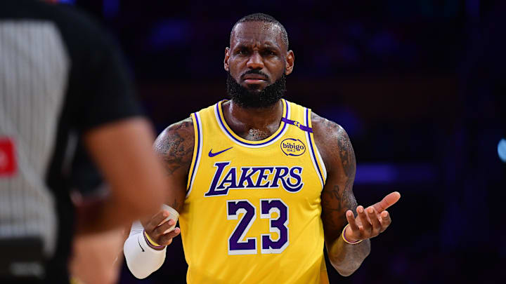 Dec 31, 2024; Los Angeles, California, USA; Los Angeles Lakers forward LeBron James (23) reacts during the first half at Crypto.com Arena. Mandatory Credit: Gary A. Vasquez-Imagn Images