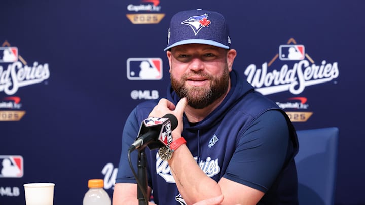 Oct 28, 2025; Los Angeles, California, USA; Toronto Blue Jays manager John Schneider (14) speaks at the postgame press conference after the game against the Los Angeles Dodgers during game four of the 2025 MLB World Series at Dodger Stadium. 