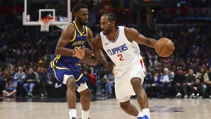 LA Clippers forward Kawhi Leonard (2) dribbles against the Golden State Warriors during the second half of the game at Crypto.com Arena. Mandatory Credit: Jessica Alcheh-Imagn Images
