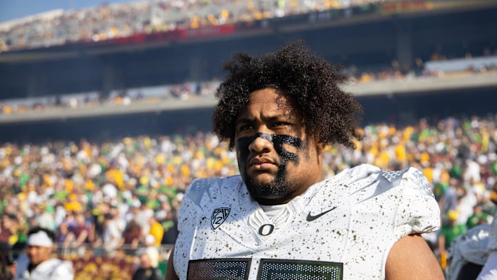 Nov 18, 2023; Tempe, Arizona, USA; Oregon Ducks offensive lineman Iapani Laloulu (72) against the Arizona State Sun Devils at Mountain America Stadium. Mandatory Credit: Mark J. Rebilas-Imagn Images