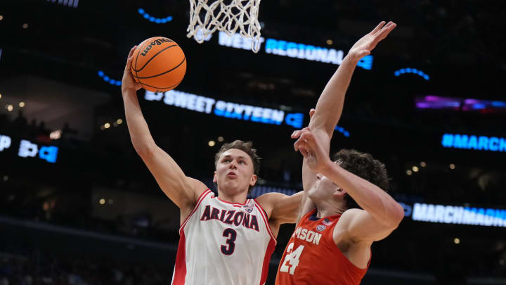Mar 28, 2024; Los Angeles, CA, USA; Arizona Wildcats guard Pelle Larsson (3) shoots against Clemson Tigers center PJ Hall (24) in the first half in the semifinals of the West Regional of the 2024 NCAA Tournament at Crypto.com Arena. Mandatory Credit: Kirby Lee-USA TODAY Sports