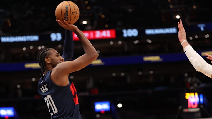 Feb 21, 2025; Washington, District of Columbia, USA; Washington Wizards forward Alex Sarr (20) makes a three point field goal against the Milwaukee Bucks in the second half at Capital One Arena. Mandatory Credit: Geoff Burke-Imagn Images