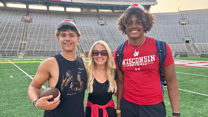 Two in-state recruits, 2028 quarterback JJ Chapman (Oak Creek), left, and outside linebacker Isaac Miller (Waukesha Catholic Memorical), right, participated in Wisconsin's summer camp on June 10.