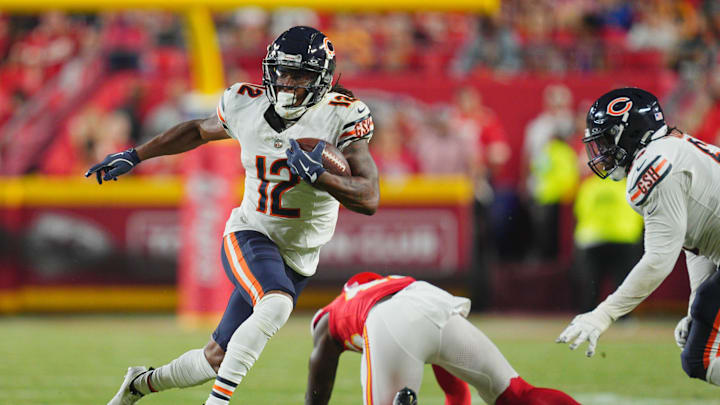 Aug 22, 2024; Kansas City, Missouri, USA; Chicago Bears wide receiver Velus Jones Jr. (12) runs for a touchdown against Kansas City Chiefs safety Tyree Gillespie (46) during the second half at GEHA Field at Arrowhead Stadium. Mandatory Credit: Jay Biggerstaff-USA TODAY Sports