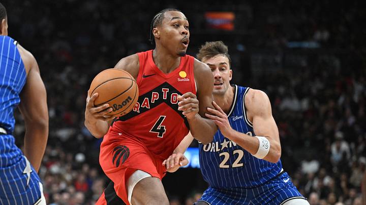 Oct 28, 2026; Toronto, Ontario, CAN;  Toronto Raptors forward Scottie Barnes (4) drives to the basket past Orlando Magic forward Franz Wagner (22) in the second  half at Scotiabank Arena.  Mandatory Credit: Dan Hamilton-Imagn Images