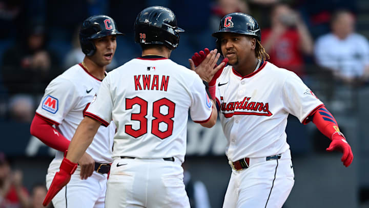 Apr 21, 2025; Cleveland, Ohio, USA; Cleveland Guardians third baseman Jose Ramirez (11) is congratulated by left fielder Steven Kwan (38) and shortstop Brayan Rocchio (4) after hitting a three run home run off New York Yankees starting pitcher Clarke Schmidt (36) during the third inning at Progressive Field. Mandatory Credit: David Dermer-Imagn Images