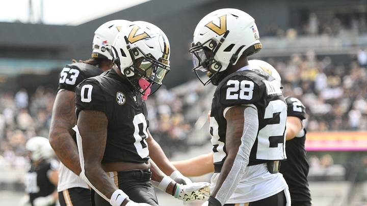 Sep 27, 2025; Nashville, Tennessee, USA; Vanderbilt Commodores wide receiver Junior Sherrill (0) celebrates with his teammates after scoring a touchdown at FirstBank Stadium. Mandatory Credit: Steve Roberts-Imagn Images Sep 27, 2025; Nashville, Tennessee, USA; Vanderbilt Commodores wide receiver Junior Sherrill (0) celebrates with his teammates after scoring a touchdown at FirstBank Stadium. Mandatory Credit: Steve Roberts-Imagn Images