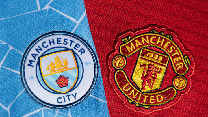 The Manchester City and Manchester United Badges
