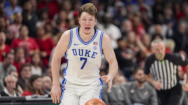 Mar 15, 2025; Charlotte, NC, USA; Duke Blue Devils guard Kon Knueppel (7) brings the ball up court against the Louisville Cardinals during the 2025 ACC Conference Championship game at Spectrum Center. Mandatory Credit: Jim Dedmon-Imagn Images