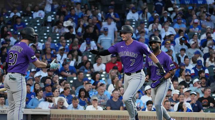 Jun 16, 2026; Chicago, Illinois, USA; Colorado Rockies first baseman TJ Rumfield (7) is greeted by right fielder Troy Johnston (20) after hitting a two-run homer against the Chicago Cubs during the fourth inning at Wrigley Field. Mandatory Credit: David Banks-Imagn Images