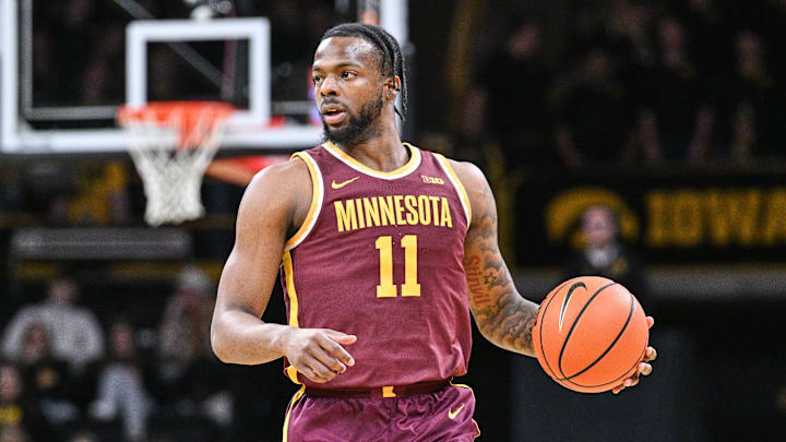 Jan 21, 2025; Iowa City, Iowa, USA; Minnesota Golden Gophers guard Femi Odukale (11) controls the ball against the Iowa Hawkeyes during the first half at Carver-Hawkeye Arena. Mandatory Credit: Jeffrey Becker-Imagn Images Jan 21, 2025; Iowa City, Iowa, USA; Minnesota Golden Gophers guard Femi Odukale (11) controls the ball against the Iowa Hawkeyes during the first half at Carver-Hawkeye Arena. Mandatory Credit: Jeffrey Becker-Imagn Images