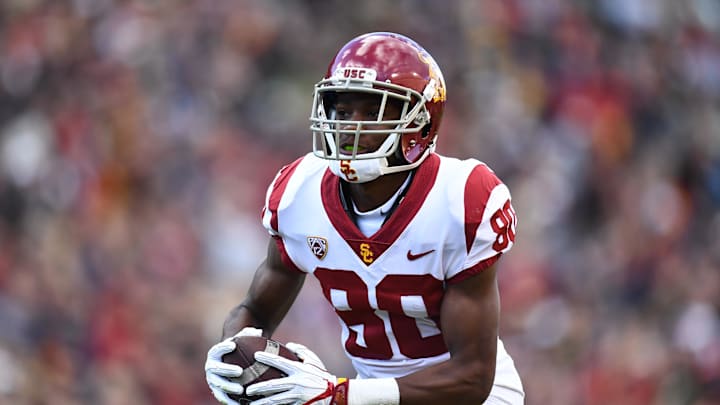 Nov 11, 2017; Boulder, CO, USA; USC Trojans wide receiver Deontay Burnett (80) following his touchdown reception in the first half against the Colorado Buffaloes at Folsom Field. Mandatory Credit: Ron Chenoy-Imagn Images Nov 11, 2017; Boulder, CO, USA; USC Trojans wide receiver Deontay Burnett (80) following his touchdown reception in the first half against the Colorado Buffaloes at Folsom Field. Mandatory Credit: Ron Chenoy-Imagn Images