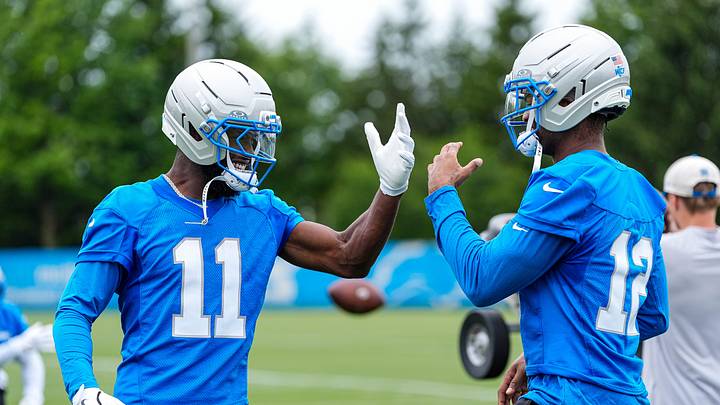 Detroit Lions wide receiver Lucky Jackson (11), left, shakes hands with wide receiver Tarik Black (12) after practice during mini camp at Meijer Performance Center in Allen Park on Wednesday, June 17, 2026.