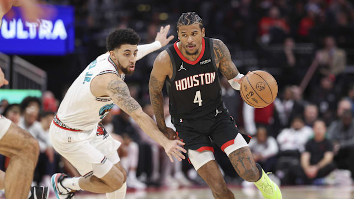 Jan 13, 2025; Houston, Texas, USA; Houston Rockets guard Jalen Green (4) dribbles the ball as Memphis Grizzlies forward Jaylen Wells (0) defends during the second half at Toyota Center. Mandatory Credit: Troy Taormina-Imagn Images Jan 13, 2025; Houston, Texas, USA; Houston Rockets guard Jalen Green (4) dribbles the ball as Memphis Grizzlies forward Jaylen Wells (0) defends during the second half at Toyota Center. Mandatory Credit: Troy Taormina-Imagn Images