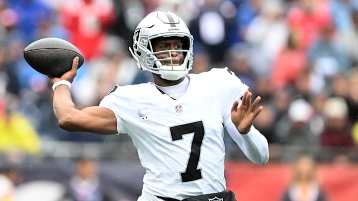 Sep 7, 2025; Foxborough, Massachusetts, USA; Las Vegas Raiders quarterback Geno Smith (7) drops back to pass against the New England Patriots during the first half at Gillette Stadium. Mandatory Credit: Brian Fluharty-Imagn Images