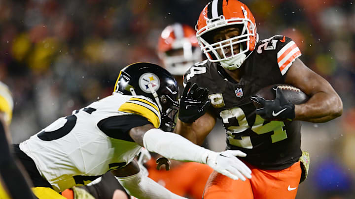 Nov 21, 2024; Cleveland, Ohio, USA; Cleveland Browns running back Nick Chubb (24) runs with the ball against Pittsburgh Steelers safety DeShon Elliott (25) during the first half at Huntington Bank Field. Mandatory Credit: Ken Blaze-Imagn Images Nov 21, 2024; Cleveland, Ohio, USA; Cleveland Browns running back Nick Chubb (24) runs with the ball against Pittsburgh Steelers safety DeShon Elliott (25) during the first half at Huntington Bank Field. Mandatory Credit: Ken Blaze-Imagn Images