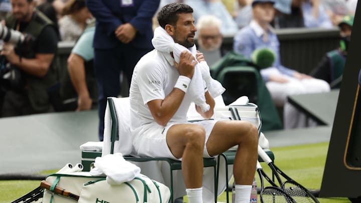 Novak Djokovic between sets of his Wimbledon semifinal loss to Jannik Sinner. 