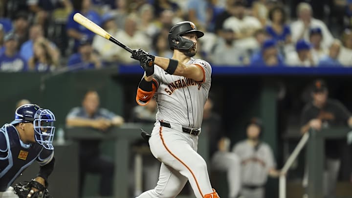 Sep 20, 2024; Kansas City, Missouri, USA; San Francisco Giants designated hitter Michael Conforto (8) bats during the eighth inning against the Kansas City Royals at Kauffman Stadium. 