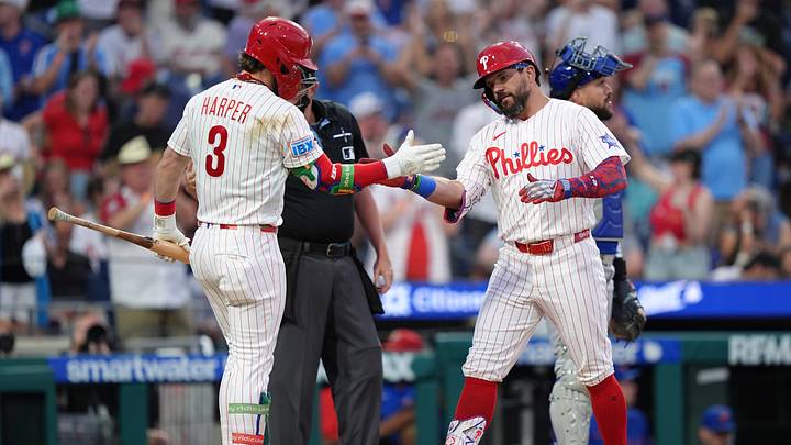 Jun 20, 2026; Philadelphia, Pennsylvania, USA; Philadelphia Phillies designated hitter Kyle Schwarber (12) reacts with infielder Bryce Harper (3) after hitting a home run against the New York Mets in the third inning at Citizens Bank Park. Mandatory Credit: Kyle Ross-Imagn Images
