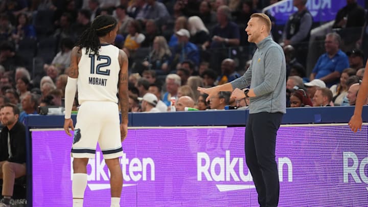 Oct 27, 2025; San Francisco, California, USA; Memphis Grizzlies guard Ja Morant (12) talks with head coach Tuomas Iisalo during a break in the action against the Golden State Warriors in the second quarter at the Chase Center. Mandatory Credit: Cary Edmondson-Imagn Images Oct 27, 2025; San Francisco, California, USA; Memphis Grizzlies guard Ja Morant (12) talks with head coach Tuomas Iisalo during a break in the action against the Golden State Warriors in the second quarter at the Chase Center. Mandatory Credit: Cary Edmondson-Imagn Images