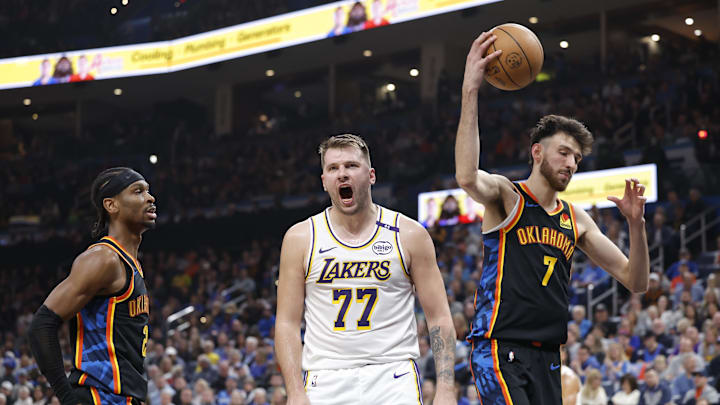Apr 6, 2025; Oklahoma City, Oklahoma, USA; Los Angeles Lakers guard Luka Doncic (77) yells after scoring against the Oklahoma City Thunder during the second quarter at Paycom Center. Mandatory Credit: Alonzo Adams-Imagn Images Apr 6, 2025; Oklahoma City, Oklahoma, USA; Los Angeles Lakers guard Luka Doncic (77) yells after scoring against the Oklahoma City Thunder during the second quarter at Paycom Center. Mandatory Credit: Alonzo Adams-Imagn Images