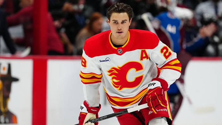 Mar 30, 2026; Denver, Colorado, USA; Calgary Flames defenseman Zach Whitecloud (28) before the game against the Colorado Avalanche at Ball Arena. Mandatory Credit: Ron Chenoy-Imagn Images