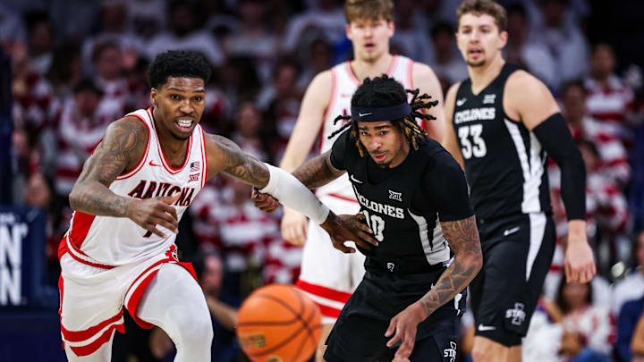 Jan 27, 2025; Tucson, Arizona, USA; Arizona Wildcats guard Caleb Love (1) and Iowa State Cyclones guard Keshon Gilbert (10) run toward the ball during the second half at McKale Center. Mandatory Credit: Aryanna Frank-Imagn Images