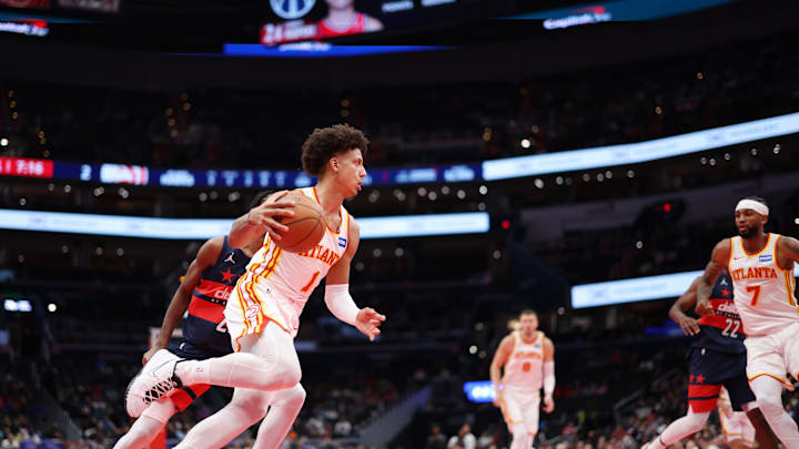 Nov 25, 2025; Washington, District of Columbia, USA; Atlanta Hawks forward Jalen Johnson (1) drives to the basket as Washington Wizards center Alex Sarr (20) defends in the first half at Capital One Arena. Mandatory Credit: Geoff Burke-Imagn Images Nov 25, 2025; Washington, District of Columbia, USA; Atlanta Hawks forward Jalen Johnson (1) drives to the basket as Washington Wizards center Alex Sarr (20) defends in the first half at Capital One Arena. Mandatory Credit: Geoff Burke-Imagn Images