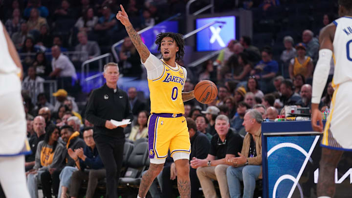Oct 18, 2024; San Francisco, California, USA; Los Angeles Lakers guard Jalen Hood-Schifino (0) calls a play against the Golden State Warriors in the first quarter at the Chase Center. Mandatory Credit: Cary Edmondson-Imagn Images
