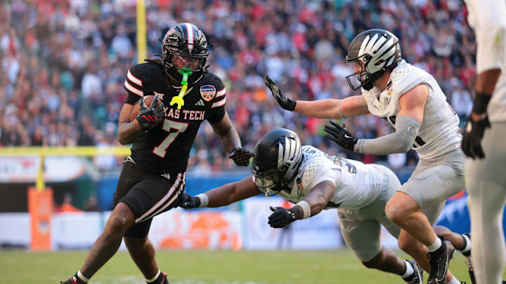Jan 1, 2026; Miami Gardens, FL, USA; Texas Tech Red Raiders tight end Terrance Carter Jr. (7) runs with the ball against the Oregon Ducks during the second half of the 2025 Orange Bowl and quarterfinal game of the College Football Playoff at Hard Rock Stadium. Mandatory Credit: Sam Navarro-Imagn Images