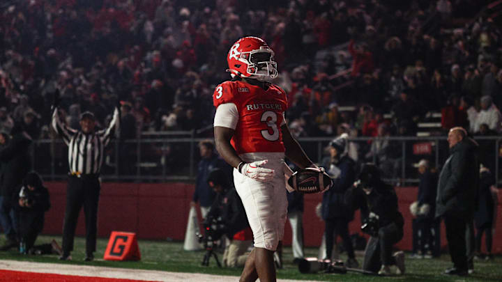 Nov 29, 2025; Piscataway, New Jersey, USA; Rutgers Scarlet Knights running back Antwan Raymond (3) celebrates his touchdown reception during the second half against the Penn State Nittany Lions at SHI Stadium. Mandatory Credit: Vincent Carchietta-Imagn Images Nov 29, 2025; Piscataway, New Jersey, USA; Rutgers Scarlet Knights running back Antwan Raymond (3) celebrates his touchdown reception during the second half against the Penn State Nittany Lions at SHI Stadium. Mandatory Credit: Vincent Carchietta-Imagn Images