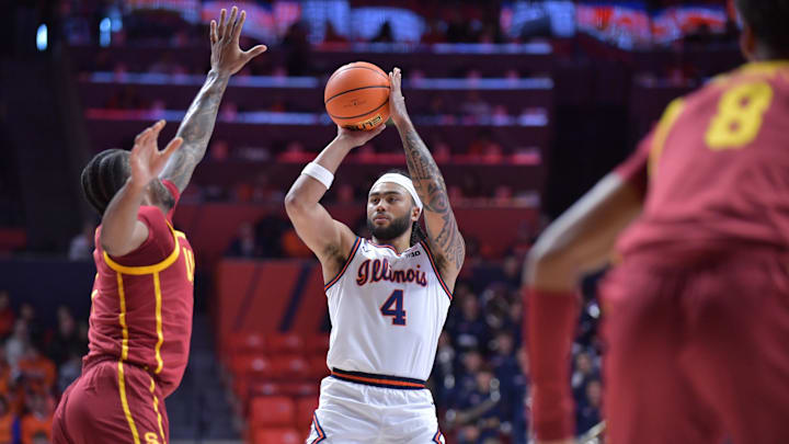 Jan 11, 2025; Champaign, Illinois, USA;  Illinois Fighting Illini guard Kylan Boswell (4) shoots the ball during the first half against the USC Trojans at State Farm Center. Mandatory Credit: Ron Johnson-Imagn Images