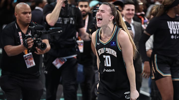 Oct 20, 2024; Brooklyn, New York, USA; New York Liberty guard Sabrina Ionescu (20) celebrates after defeating the Minnesota Lynx in game five of the 2024 WNBA Finals at Barclays Center. Mandatory Credit: Wendell Cruz-Imagn Images