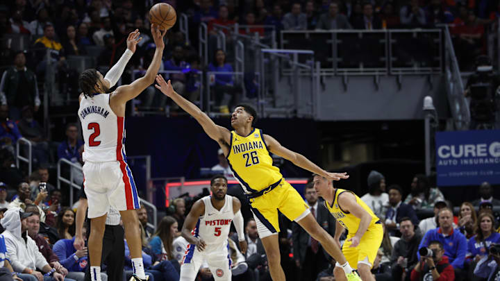 Oct 23, 2024; Detroit, Michigan, USA;  Detroit Pistons guard Cade Cunningham (2) shoots over Indiana Pacers guard Ben Sheppard (26) in the second half at Little Caesars Arena. Mandatory Credit: Rick Osentoski-Imagn Images