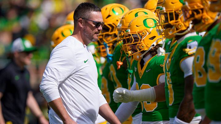Oregon head coach Dan Lanning walks the field during warmups as the Oregon Ducks host the Boise State Broncos on Sept. 5, 2026, at Autzen Stadium in Eugene, Oregon.