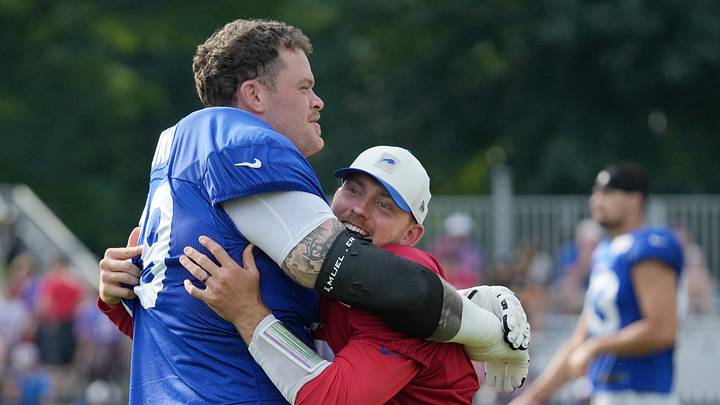 Bills quarterback Shane Buechele jokes with lineman Spencer Brown during the final day of Buffalo Bills training camp at St. John Fisher University Friday, August 7, 2026 in Pittsford. Bills quarterback Shane Buechele jokes with lineman Spencer Brown during the final day of Buffalo Bills training camp at St. John Fisher University Friday, August 7, 2026 in Pittsford.