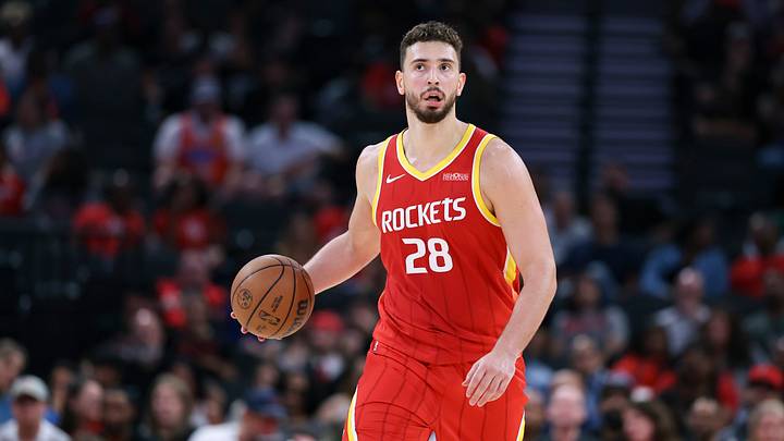 Oct 15, 2026; Houston, Texas, USA; Houston Rockets center Alperen Sengun (28) controls the ball during the game against the Oklahoma City Thunder at Toyota Center. Mandatory Credit: Troy Taormina-Imagn Images