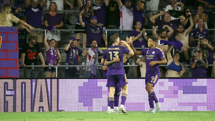 Aug 31, 2024; Orlando, Florida, USA; Orlando City midfielder Facundo Torres (10) celebrates  with Orlando City forward Duncan McGuire (13) and Orlando City forward Luis Muriel (9) after he scored a goal against Nashville SC during the second half at Inter&Co Stadium. Mandatory Credit: Kim Klement Neitzel-Imagn Images