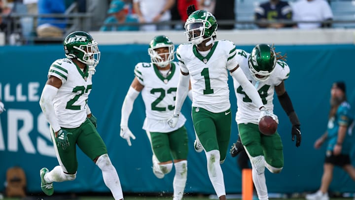 Dec 15, 2024; Jacksonville, Florida, USA; New York Jets cornerback Sauce Gardner (1) celebrates after an interception against the Jacksonville Jaguars in the fourth quarter at EverBank Stadium. Mandatory Credit: Nathan Ray Seebeck-Imagn Images