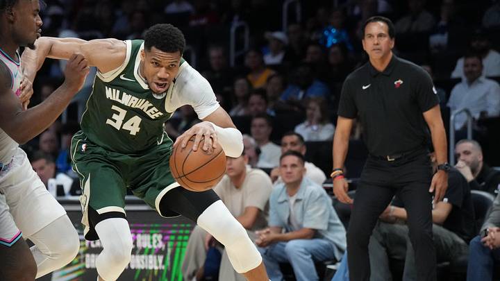 Apr 5, 2025; Miami, Florida, USA; Milwaukee Bucks forward Giannis Antetokounmpo (34) drives past Miami Heat guard Davion Mitchell (45) during overtime at Kaseya Center. Mandatory Credit: Jim Rassol-Imagn Images Apr 5, 2025; Miami, Florida, USA; Milwaukee Bucks forward Giannis Antetokounmpo (34) drives past Miami Heat guard Davion Mitchell (45) during overtime at Kaseya Center. Mandatory Credit: Jim Rassol-Imagn Images