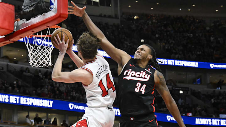 Apr 4, 2025; Chicago, Illinois, USA; Chicago Bulls forward Matas Buzelis (14) shoots against Portland Trail Blazers forward Jabari Walker (34) during the second half at the United Center. Mandatory Credit: Matt Marton-Imagn Images Apr 4, 2025; Chicago, Illinois, USA; Chicago Bulls forward Matas Buzelis (14) shoots against Portland Trail Blazers forward Jabari Walker (34) during the second half at the United Center. Mandatory Credit: Matt Marton-Imagn Images